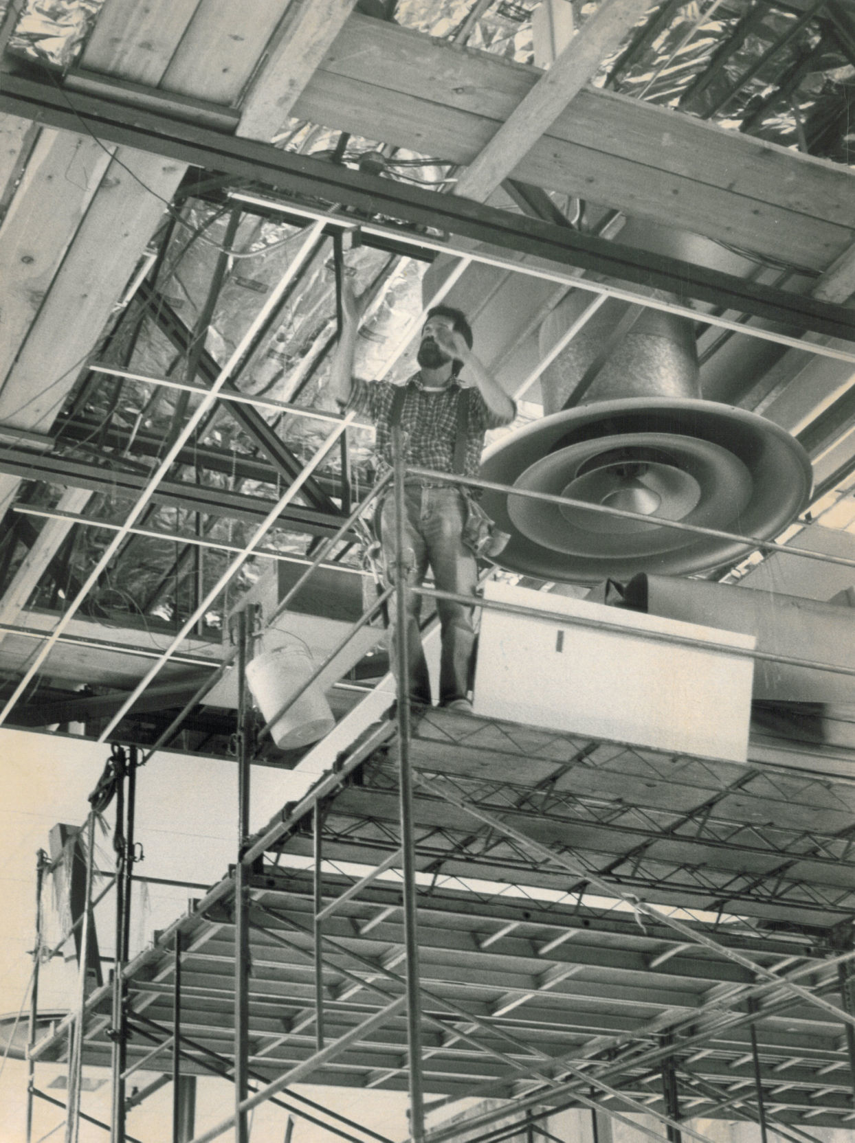 Worker repairs damage